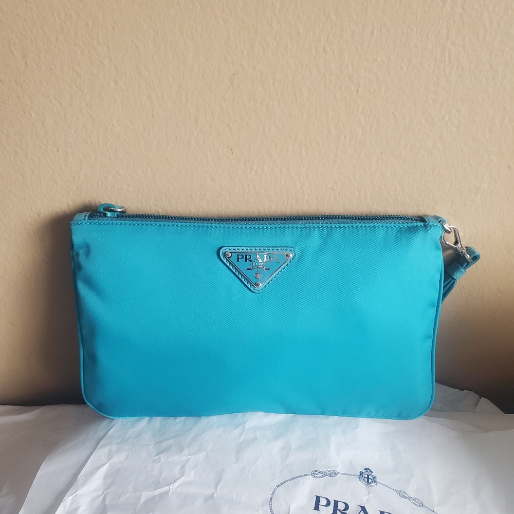 Authentic Prada nylon wristlet in light teal color